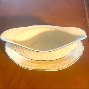 Ducal Ware. England. Gravy boat. Blue and gold stripe with motif.